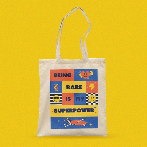 Tote bag with colorful design and text 'Being Rare is My Superpower' with Zebra graphic